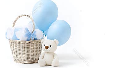 Gift basket with blue balloons and white teddy bear,