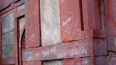 Visitors leave their mark graffiti on the walls of Barber Tomb