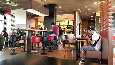 People inside McDonalds fast food restaurant in Kyiv city, Ukraine