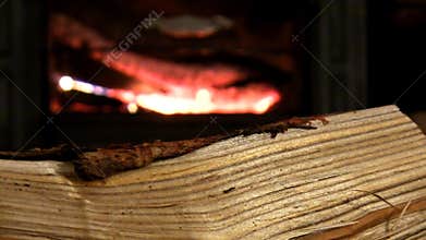 Log by the fire on cold night; 4