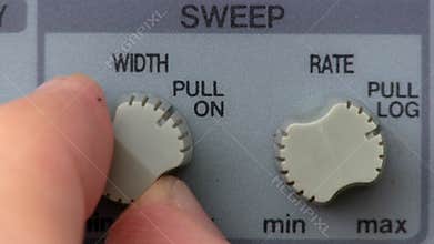 Dual knob turn; signal generator frequency sweep