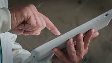 Man Working With A Tablet