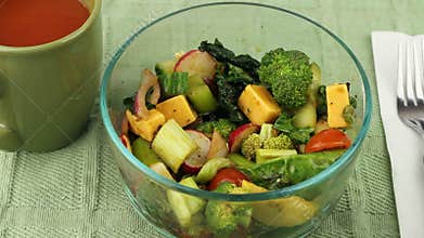 Eating Healthy Salad and Drinking Beverage