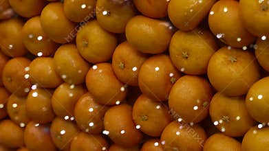 A beautiful arrangement of fresh, juicy oranges stacked together in a vibrant display