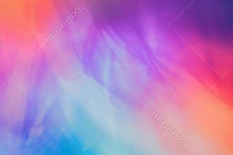 Abstract colorful background with a soft blur of blue, purple, and orange hues.