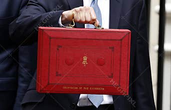 man holding chancellors red box containing the UK budget.