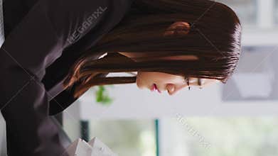 Vertical Video Developer analyzing 3d building model at realty office