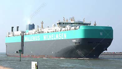 A huge vehicle carrier ship entering port in Durban, South Africa