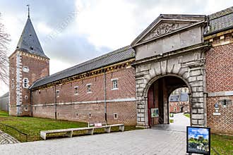 Majestic old Alden Biesen castle from 16th century, arched entrance