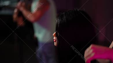 At the hairdressing school, aspiring hairdressers practice techniques on mannequins. With the help of mannequins wearing