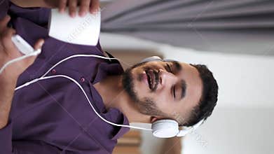 Vertical music energy fun playlist man headphones