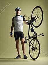 Bicyclist Standing With Bicycle