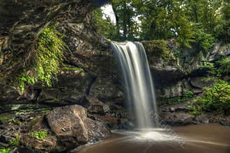 Beautiful waterfall in the spring forest