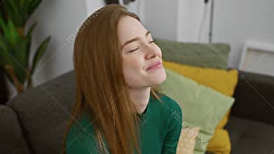 Blushing blonde! young woman in a cozy sweater, giggling with embarrassed delight, covering her laughing mouth, consumed by juicy