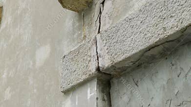 Cracked broken damaged wall of a building after an earthquake accident