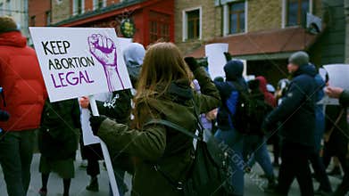 Keep abortion legal purple feminism fist banner. Women feminists rights placard.
