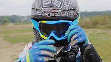 Boy (MR) dressed and equipped for motorbike