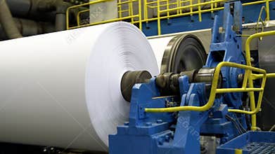 Rolling paper sheet with rotating drum on production line