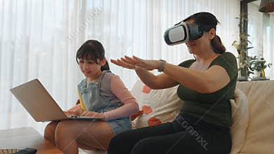 Granddaughter guide grandmother to dive in metaverse with VR. Divergence.