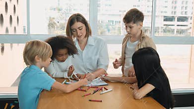 Student and teacher drawing and coloring by using marker or crayon. Erudition.