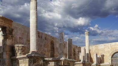 Roman Theatre in Amman, Jordan. Against the sky with clouds. 4K, time lapse