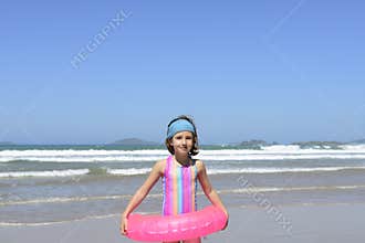 Summer fun portrait: kid at the beach