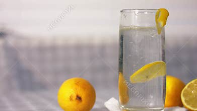 Serving of fizzy lemonade juice in a glass