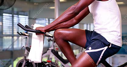 Fit man on the exercise bike