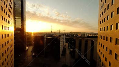 Aerial view of modern city financial district at sunset