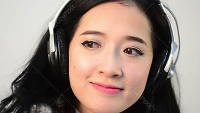 Eye not contact shot of Asian woman teenager relaxation