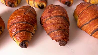 Chocolate croissants arranged neatly