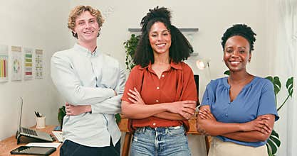 Smiling Diverse Business Team Posing Confidently In A Modern Office Environment