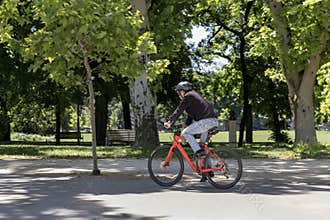 Biking in Budapest City Park (Városliget) on a Sunny Day.For editorial use only.