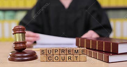 Justice comes alive with a gavel and the power of the Supreme Court in a quiet courtroom