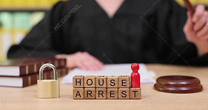 Courtroom decision on house arrest with authority and consequences in focus