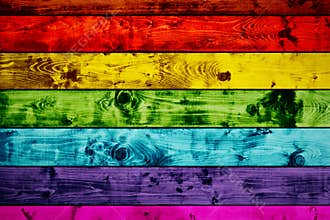 Grunge colorful wood planks background in rainbow colors