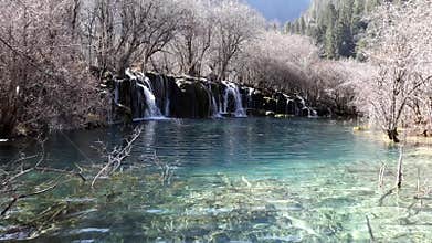 Beautiful lake with watefall in jiuzhaigou