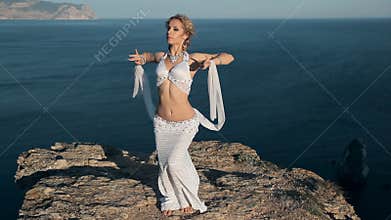 Beautiful girl shows all the beauty of oriental