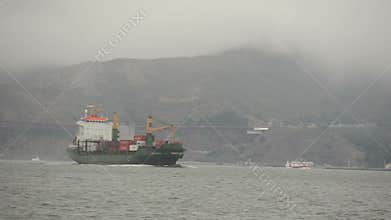 Cargo ship in fog