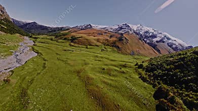 An epic FPV drone flight offering stunning views of mountain untouched terrain, filled with volcanic fields and glacial rivers