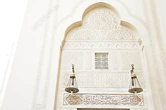 Islamic art patterns on a mosque wall