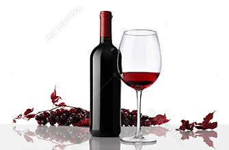 Composition of wine bottle and glass with bunch of grapes