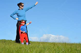 Superhero mother and child - girl power