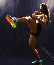 Strong sports woman training martial arts