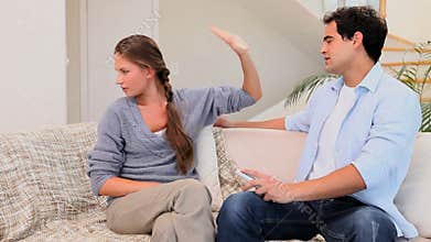 Video of a couple having an argument while watching television