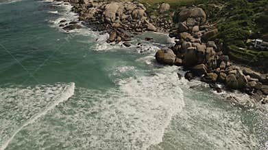 Iconic View of Camps Bay Boulders and Cloudy Twelve Apostles