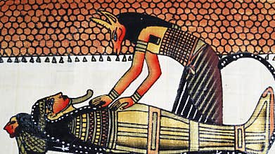 Ancient Egyptian mummification scene on papyrus, priest performing ritual on mummy, hieratic art, funeral ceremony, religious