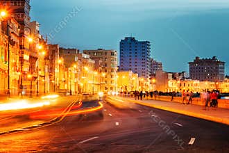 Sunset in Old Havana with the street lights of El Malecon