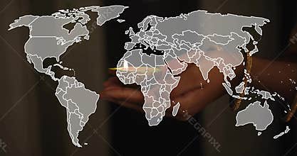 Holding dark-sleeved hands cupping light disc with rainbow streak, gold ring, dim room map overlay