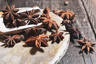 Star Anise on wooden Background